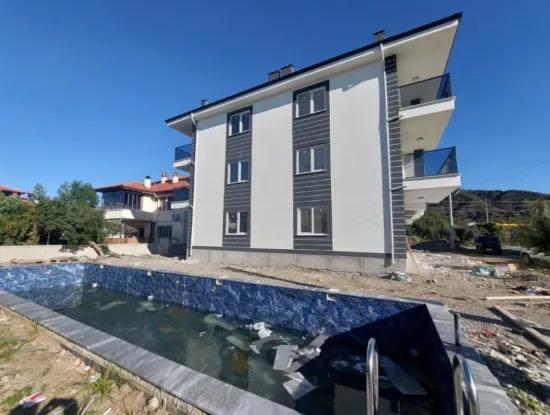 1 1 Flat Located On The Middle Floor Of A Brand New 3-Storey Building With A Swimming Pool In The Center Of Muğla Ortaca Is For Sale