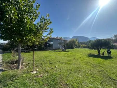 955 M² Detached Land With Mountain And Nature View In Ortaca Okçular For Sale