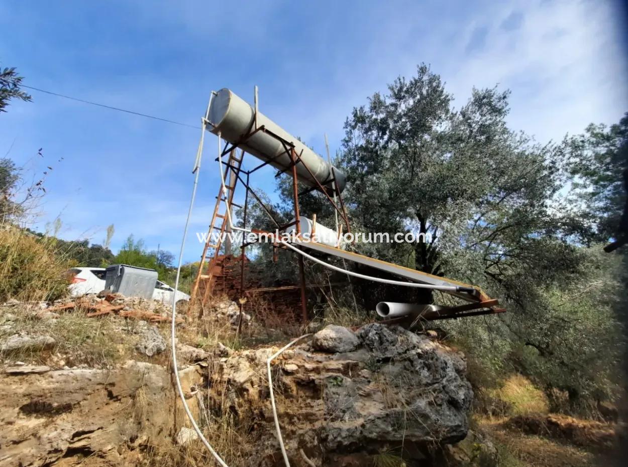 Göcek Gökçeovacıkta Deniz Manzaralı 11,650M2 Müstakil Arazi Ve 1+1 Ev Satılık